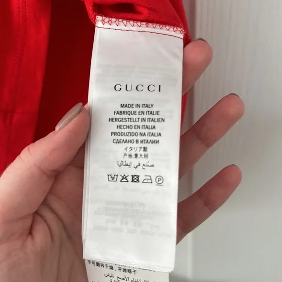 Size Small, red men’s Gucci T-shirt